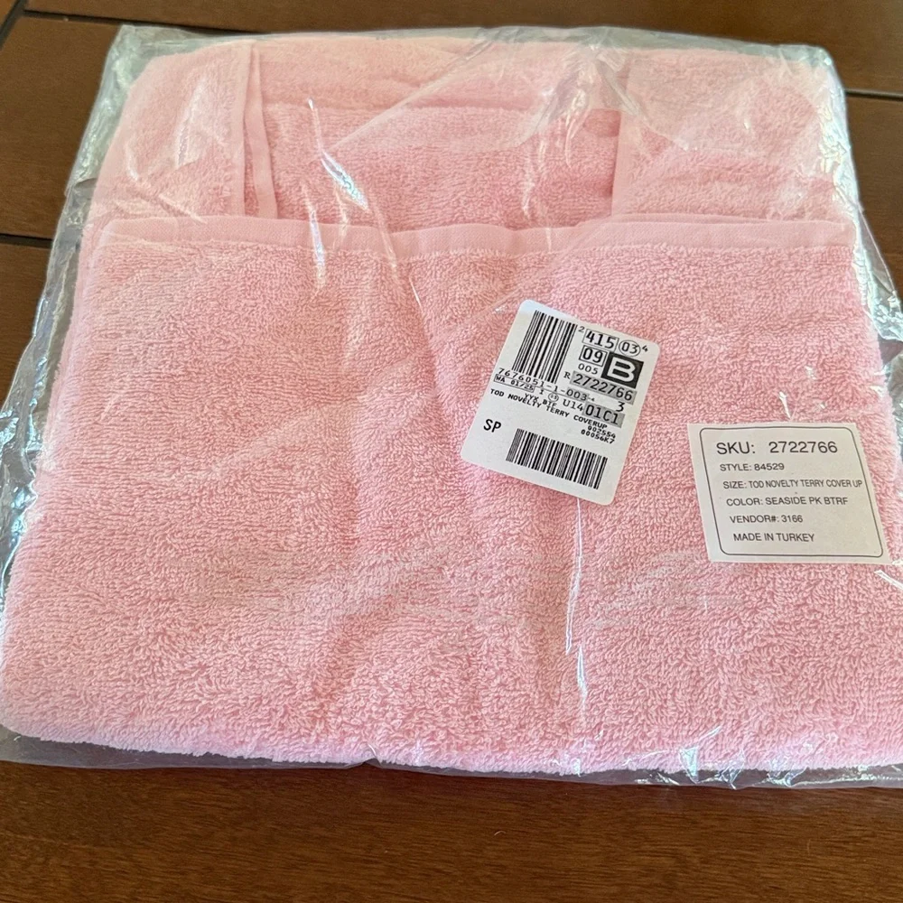 Pink hooded baby towel with a butterfly design. Land’s End